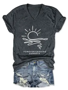 Casual dark gray V-neck T-shirt featuring a sunset graphic paired with denim shorts