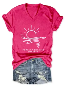 Detail view of Forever Chasing Sunsets white graphic print on pink V-neck cotton T-shirt