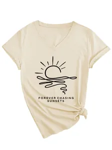 Close-up view of beige V-neck T-shirt with sunset graphic and stylish knotted detail