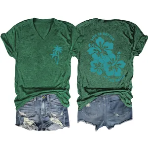 Front and back view of casual green V-neck t-shirt with tropical hibiscus beach print