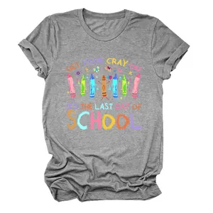 Macro detail of heather grey t-shirt featuring colorful 'Get Your Cray On' school graphic print