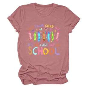Detailed view of a mauve T-shirt featuring a 'Get Your Cray On' crayon graphic print.