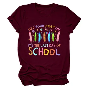 Detail of maroon t-shirt with 'Get Your Cray On' colorful school graphic print.