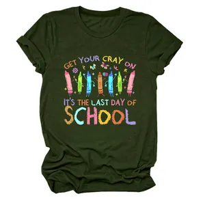 Detail of dark green T-shirt featuring 'Last Day of School' colorful crayon graphic.