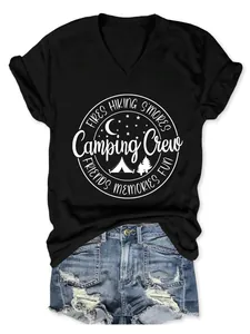 Close-up detail of black women's V-neck t-shirt with white Camping Crew graphic