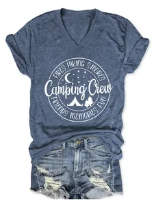 Detail of a women's blue V-neck T-shirt with a white 'Camping Crew' graphic print.