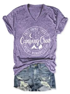 Close-up detail of a purple heather V-neck t-shirt with a white Camping Crew graphic print