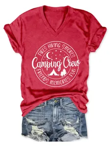 Detailed view of a red V-neck short sleeve T-shirt with white Camping Crew graphic print.