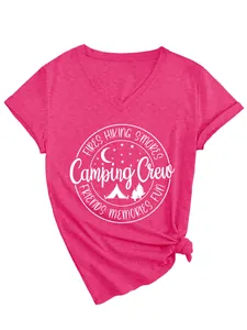Close-up of pink v-neck t-shirt with camping crew graphic and side knot detail.