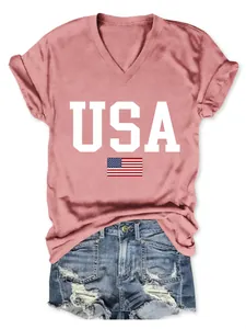 Detail view of pink V-neck t-shirt featuring white USA text and American flag print