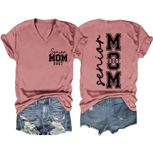 Detail view of Senior Mom 2027 V-neck t-shirt and distressed denim shorts outfit