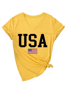 Detail view of yellow V-neck T-shirt with USA text and flag print