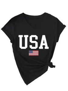 Detailed view of women's black V-neck T-shirt with USA flag and text graphic print.