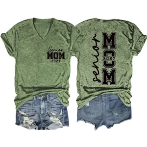 Front and back view of green Senior Mom 2027 V-neck t-shirt and denim shorts
