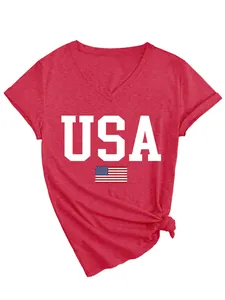 Macro detail view of a women's red V-neck T-shirt with bold white USA print and flag
