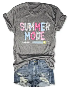 Close-up of 'Summer Mode Loading' colorful graphic on a grey women's casual t-shirt