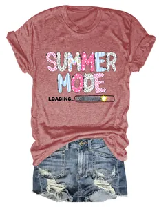 Close-up of women's red T-shirt with 'Summer Mode Loading' colorful graphic print.