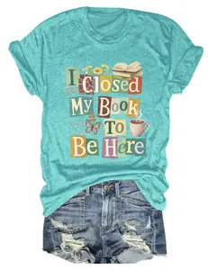 Women's teal graphic t-shirt featuring 'I Closed My Book To Be Here' print and denim shorts