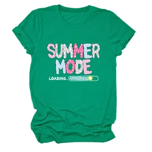 Detailed view of the 'Summer Mode Loading' graphic print on a green crew neck T-shirt