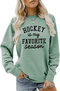 Detail view of the green Hockey Is My Favorite Season sweatshirt with black letter print