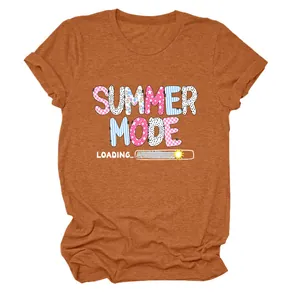 Detailed view of the colorful summer mode loading graphic print on an orange cotton T-shirt
