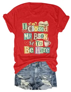 Detail view of red crew-neck T-shirt with 'I Closed My Book To Be Here' slogan
