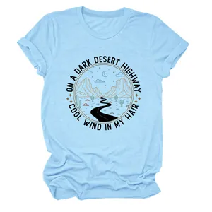 T-shirt en coton bleu clair avec imprimé graphique rétro desert highway et slogan