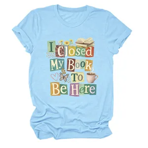 Detailed macro view of light blue crew neck T-shirt with vintage book lover print