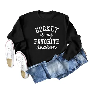 Detail of black sweatshirt featuring 'Hockey is my Favorite Season' white print