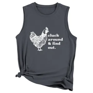 Detail of a charcoal tank top with cluck around & find out chicken print and knotted hem.