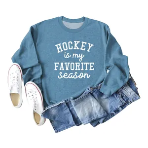 Comfortable blue crewneck sweatshirt with 'Hockey Is My Favorite Season' print detail.