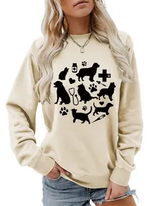 Detailed macro view of cute cat dog paw and stethoscope graphic on cream sweatshirt