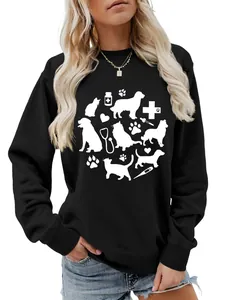 Close-up detail of women's black sweatshirt with cute pet and vet medical silhouettes