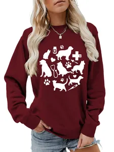 Close-up of women's burgundy sweatshirt with white pet and veterinary graphics