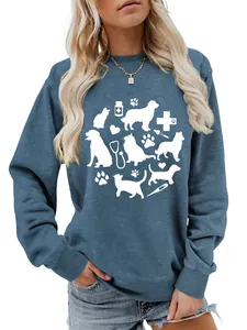 Detail view of a women's blue sweatshirt with white pet and veterinary graphic prints