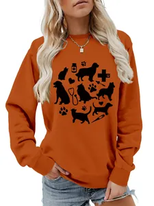 Detail view of women's orange long sleeve sweatshirt featuring cute cat dog medical prints