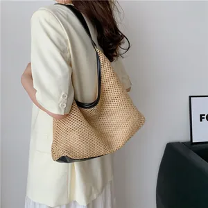 Large capacity woven straw tote bag with black faux leather shoulder strap for casual wear