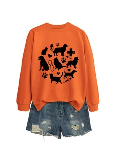 Close-up of orange sweatshirt featuring a medical themed cat and dog graphic print