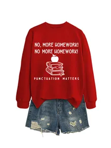 Red sweatshirt featuring 'No More Homework' print and Punctuation Matters slogan detail