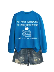 Blue crewneck sweatshirt with 'Punctuation Matters' graphic and denim shorts.