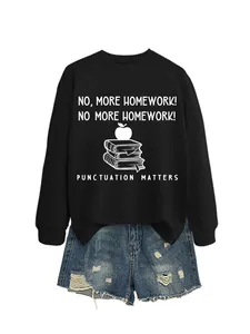 Detailed close-up showing the Punctuation Matters graphic on a black crewneck sweatshirt