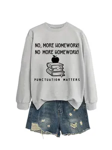 Close-up of the 'No More Homework' graphic on this casual grey crewneck sweatshirt