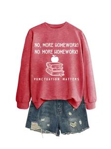 Close-up of red crewneck sweatshirt with funny punctuation matters educational slogan print