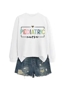 White pediatric nurse crewneck sweatshirt paired with distressed blue denim shorts