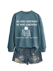Close-up of blue crewneck sweatshirt with No More Homework print and denim shorts