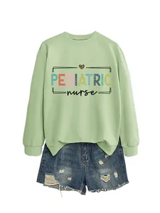 Detailed view of this light green crewneck sweatshirt featuring a 'Pediatric Nurse' graphic