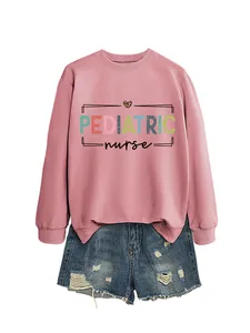 Detailed view of pink pediatric nurse sweatshirt with colorful lettering