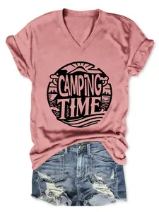 Women's pink V-neck t-shirt with 'CAMPING TIME' graphic and distressed denim shorts.