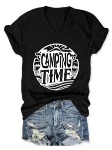 Detail shot of a black V-neck camping time T-shirt paired with denim shorts.