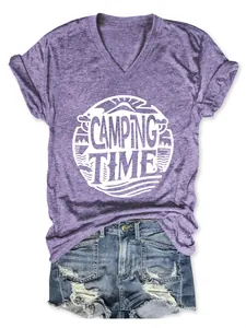 Detail of a purple V-neck T-shirt with 'Camping Time' graphic and distressed denim shorts.